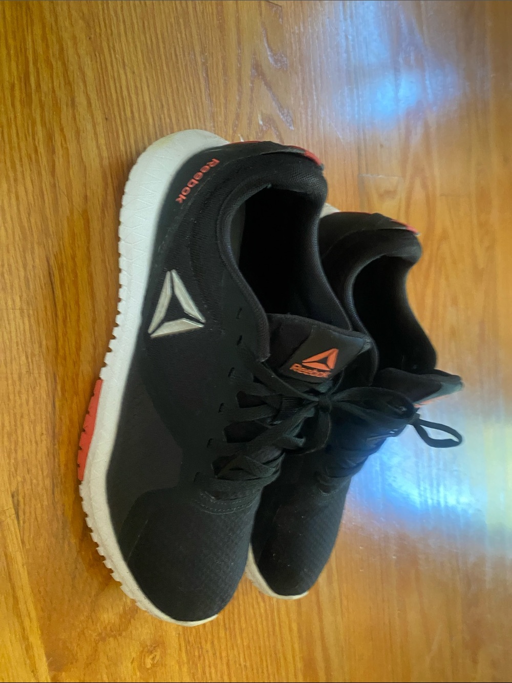 Reebok Black Athletic Trainers with White Sole and Red Accents